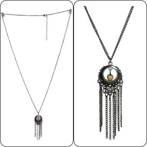 Paparazzi necklace with yellow bead on a silver Chain.